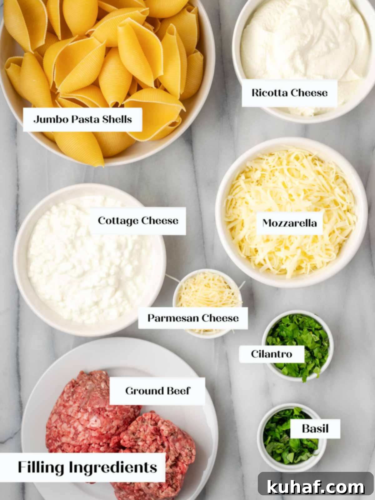 ingredients for stuffed shells on marble.
