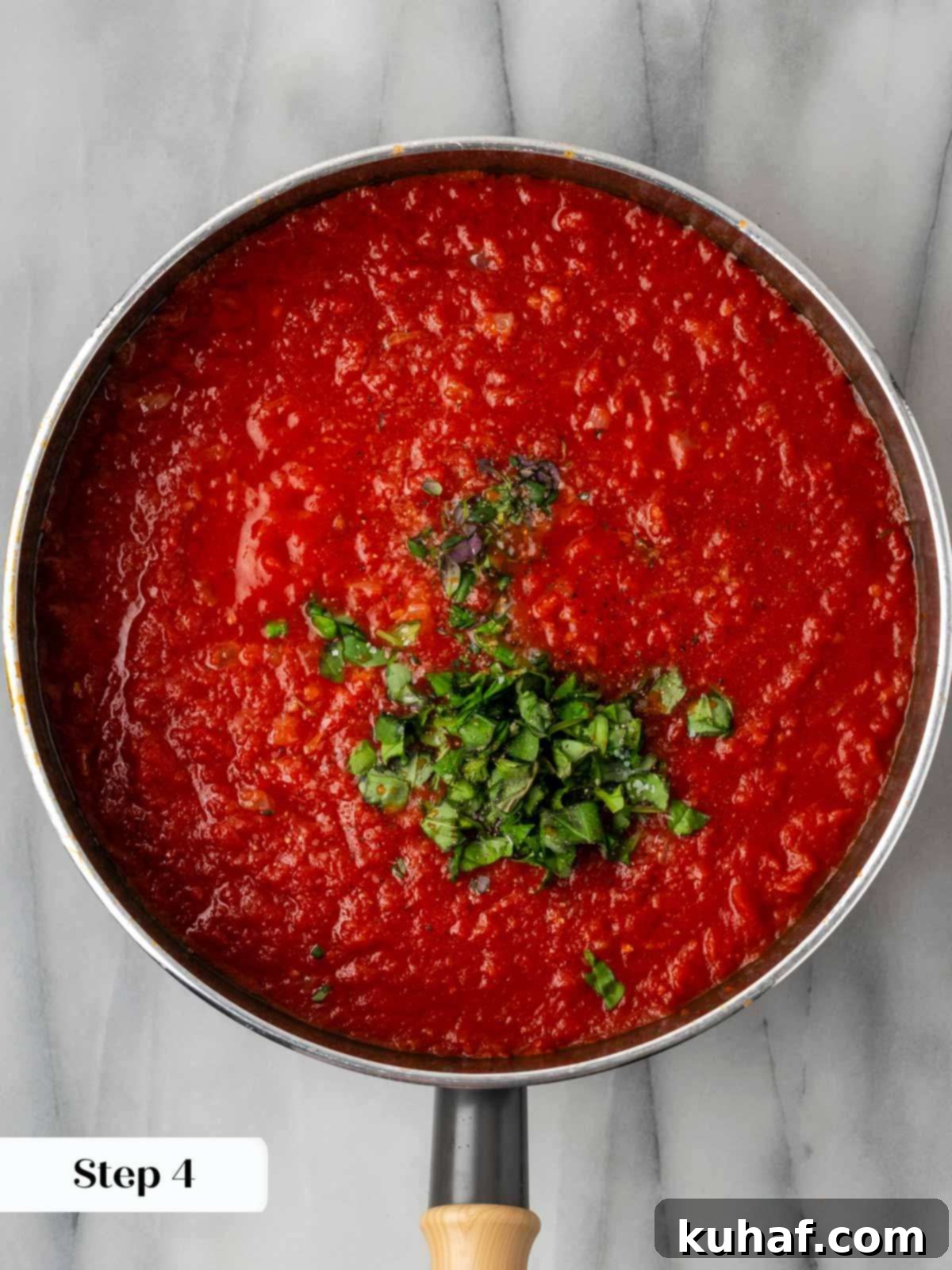 making red sauce in pan.