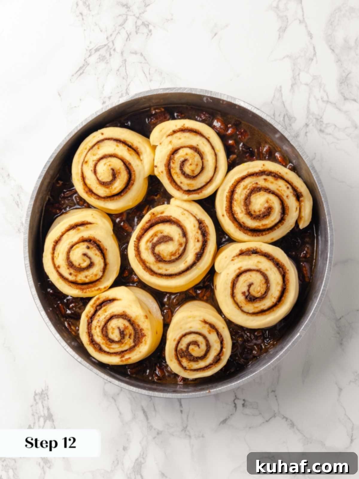 Sticky buns in the pan after proofing, ready to bake.