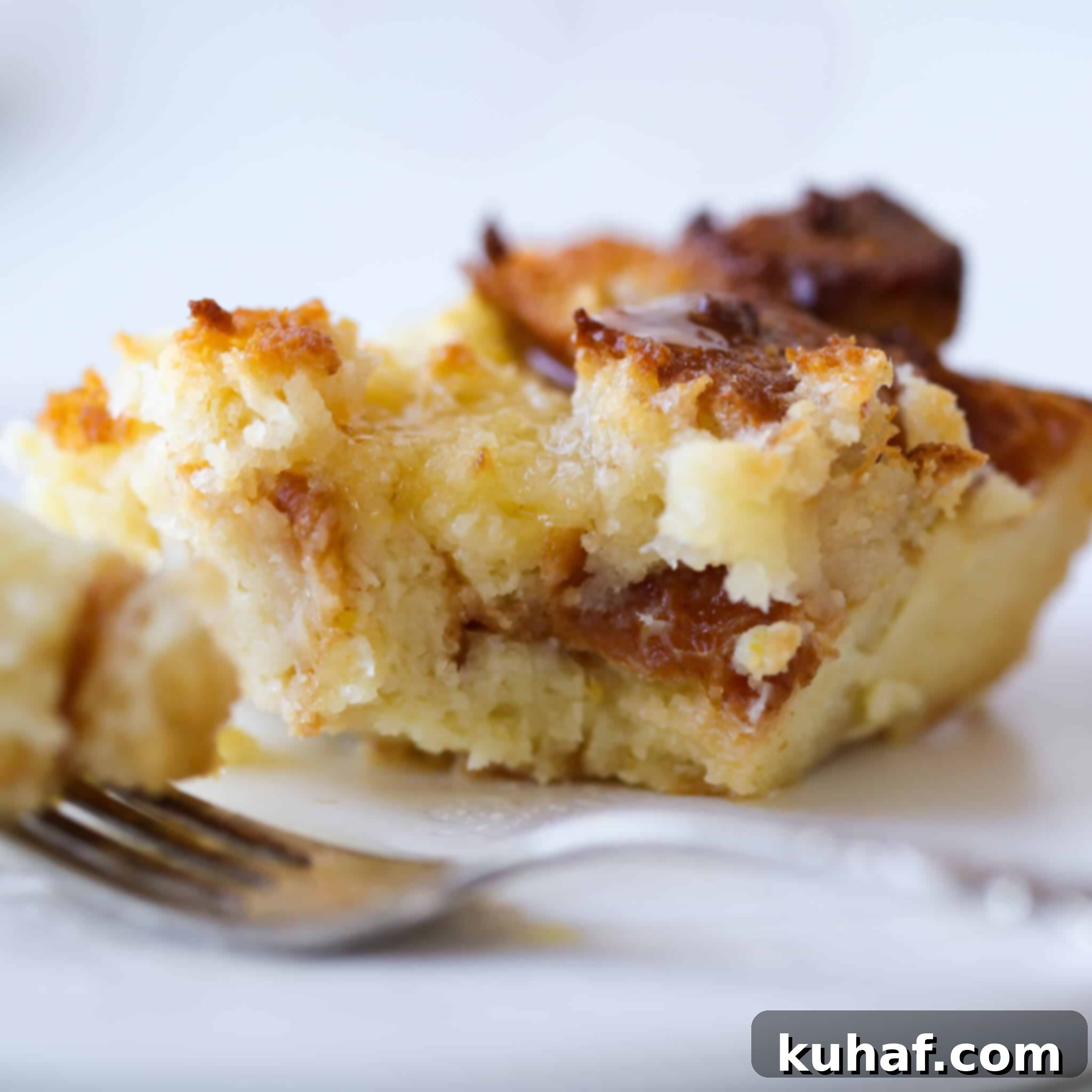 Another beautiful slice of Lemon Raspberry Bread Pudding, showcasing texture