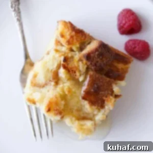 Lemon Raspberry Bread Pudding slice white plate fresh raspberries