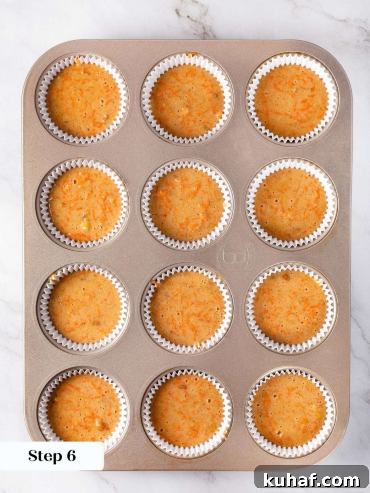 Spiced Carrot Cupcake Bliss 13 Freshly baked cupcakes in muffin tin
