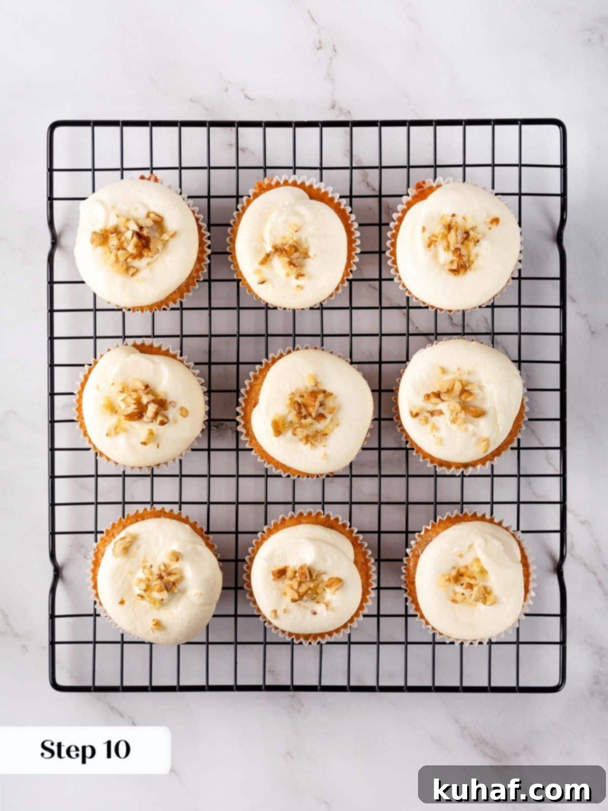 Spiced Carrot Cupcake Bliss 17 A set of carrot cupcakes after being frosted and ready to serve.
