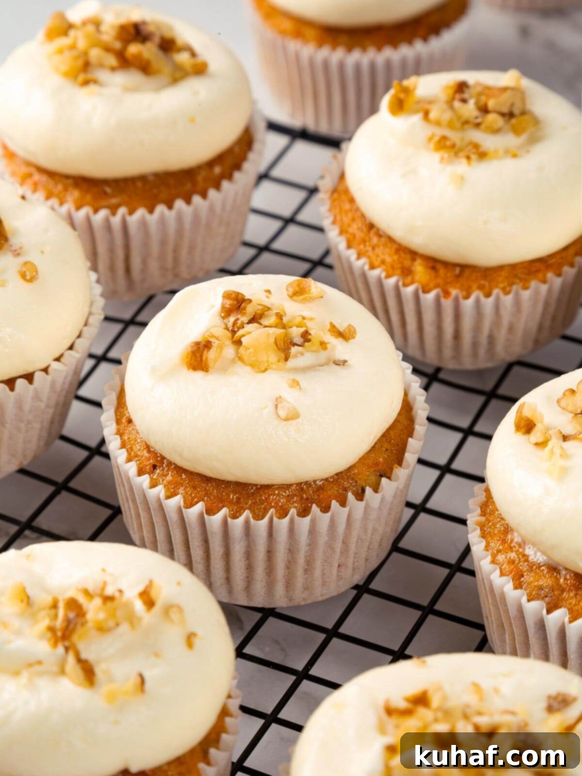 Spiced Carrot Cupcake Bliss 18 Frosted carrot cupcakes with smooth cream cheese topping.