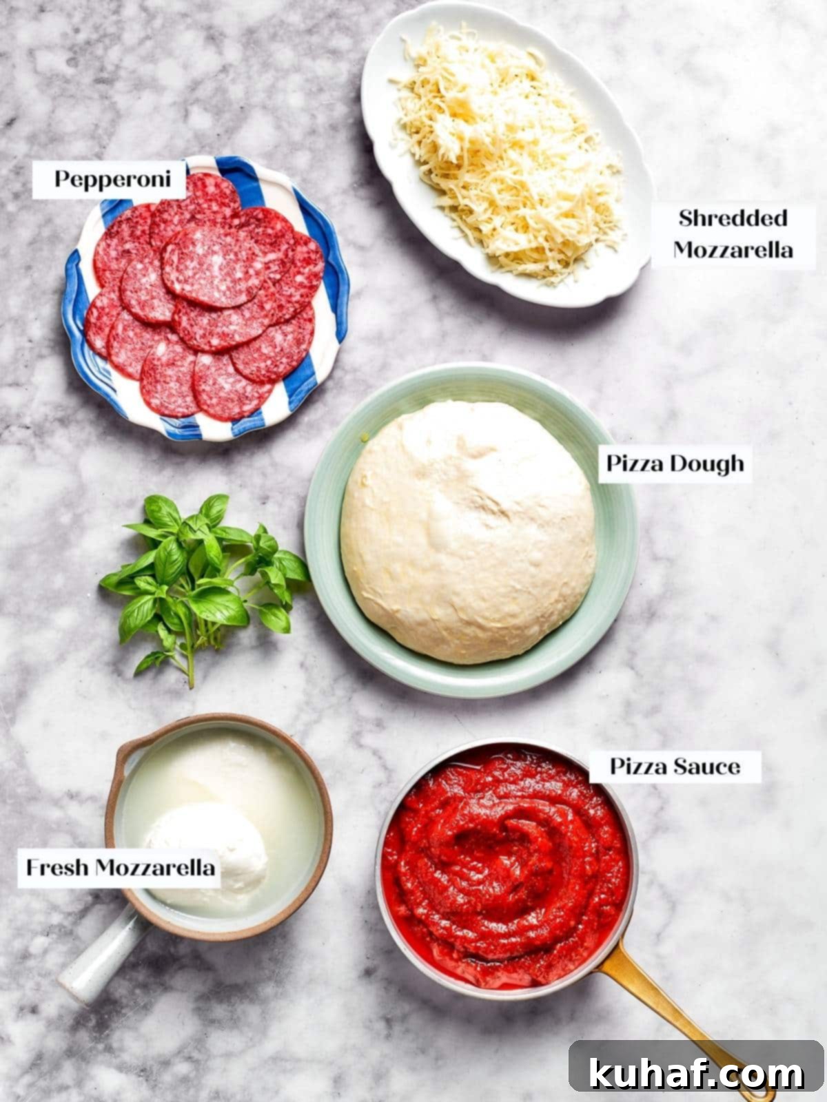 All pepperoni pizza ingredients displayed on the kitchen counter.