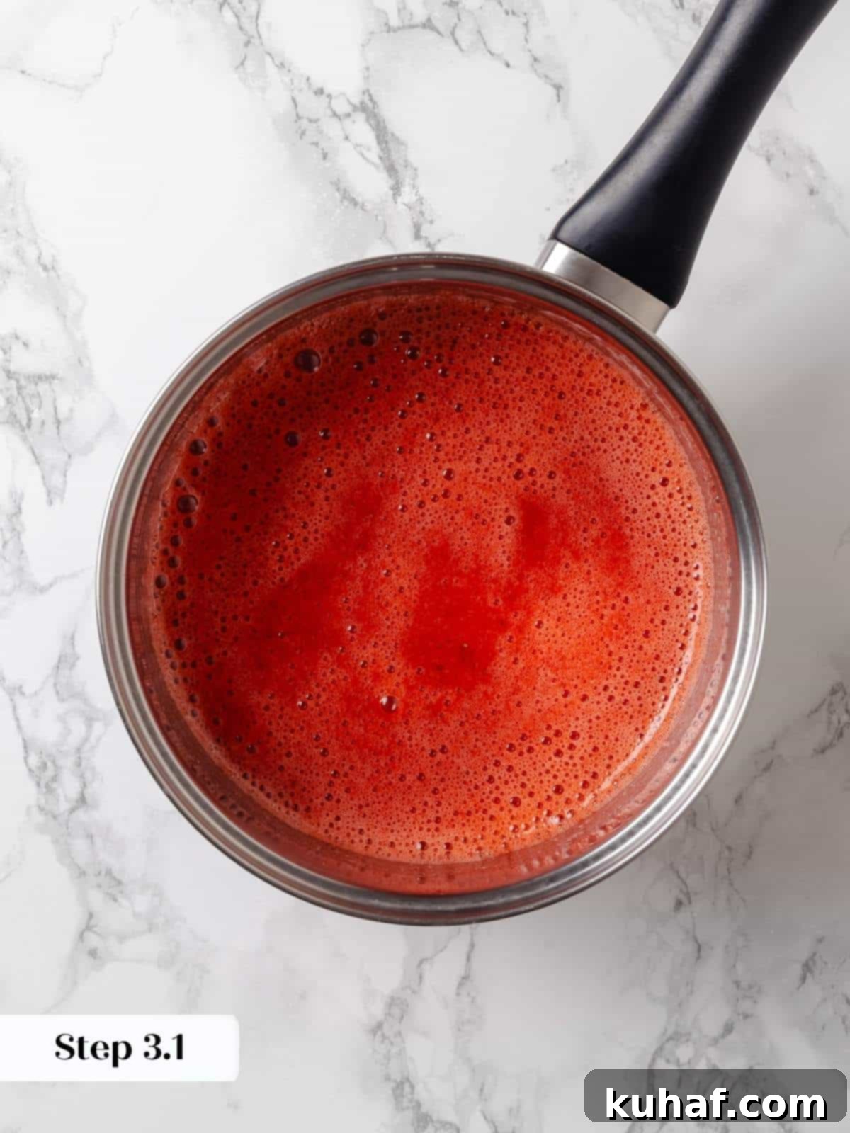 Liquid cornstarch mixture being slowly added to simmering fruit to achieve the desired jam texture.