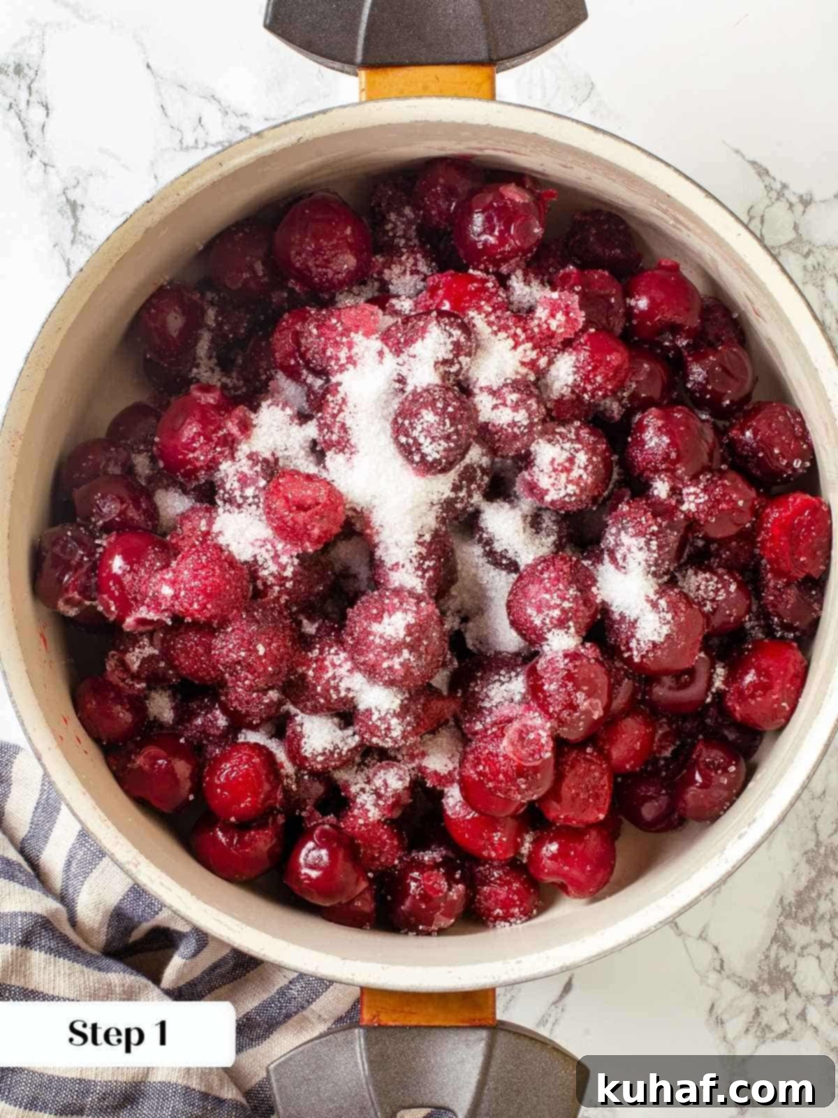 Cherries, sugar, and extract combined in a saucepan before thickening for pie filling.