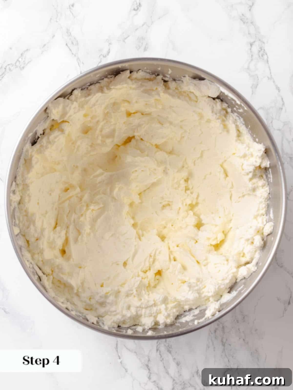 Stand mixer with softened cream cheese mixed until no lumps remain before adding other ingredients.