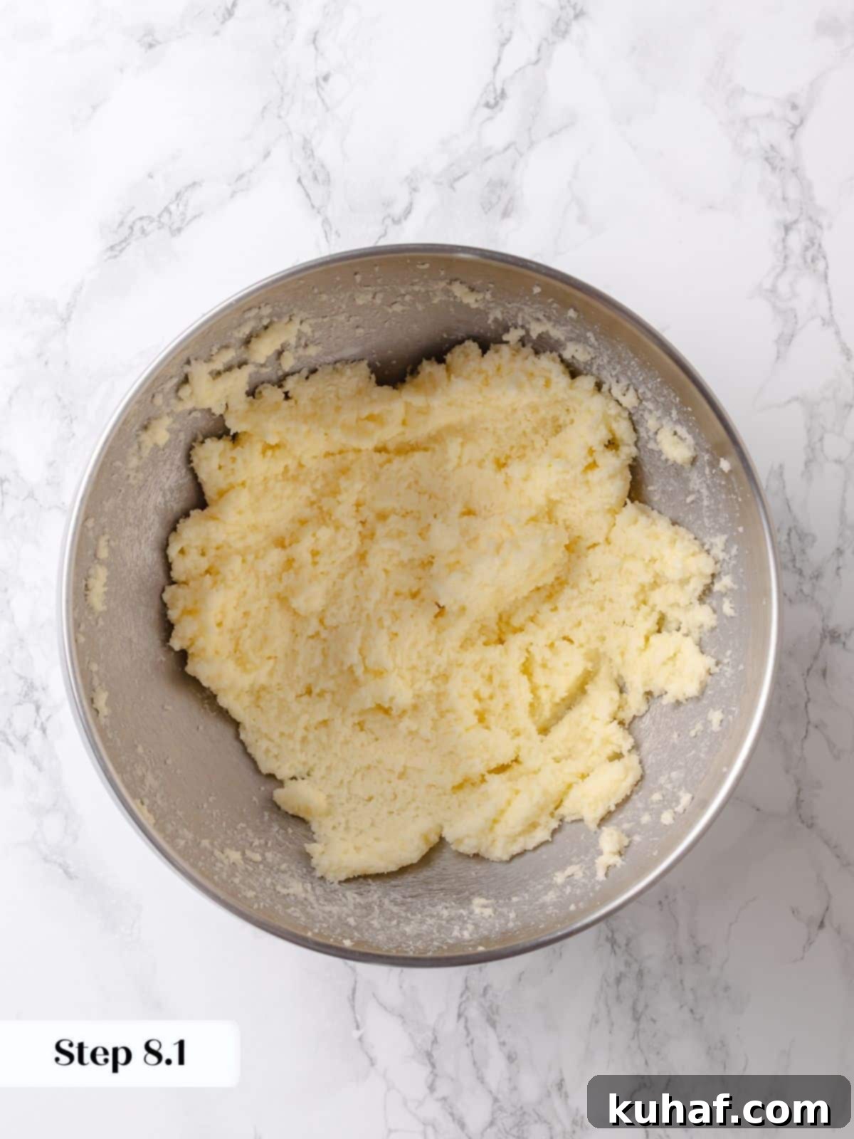 Softened butter and sugar are creamed together to start the base of the cake.
