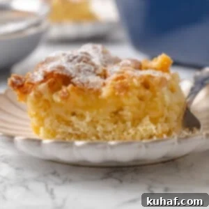 Center of gooey butter cake shown with buttery filling layered over the yeasted cake base.