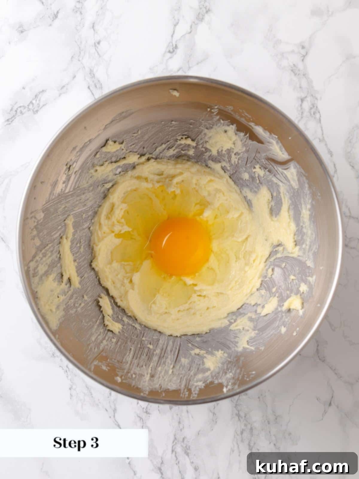 One egg is incorporated into the batter, adding moisture and richness.