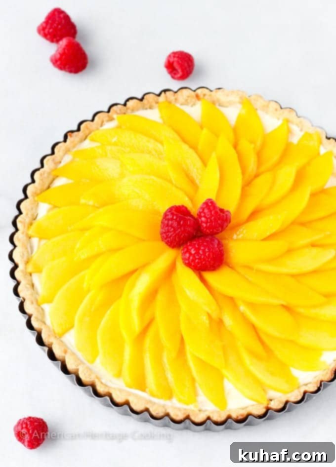 Exotic Mango Coconut Tart 2 A vibrant Coconut Mango Tart, fresh and ideal for summer, topped with sliced mangoes.