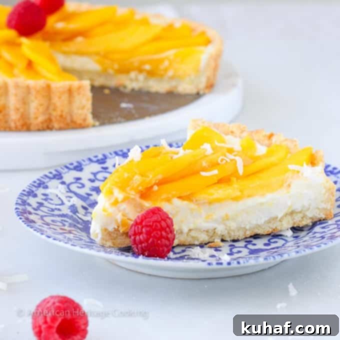 Exotic Mango Coconut Tart 6 A beautifully presented Coconut Mango Tart, ready to be served at a summer gathering.