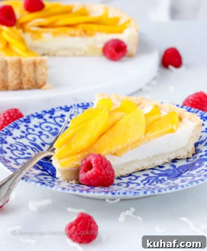 Exotic Mango Coconut Tart 7 Another perspective of the fresh Coconut Mango Tart, highlighting its appealing presentation.