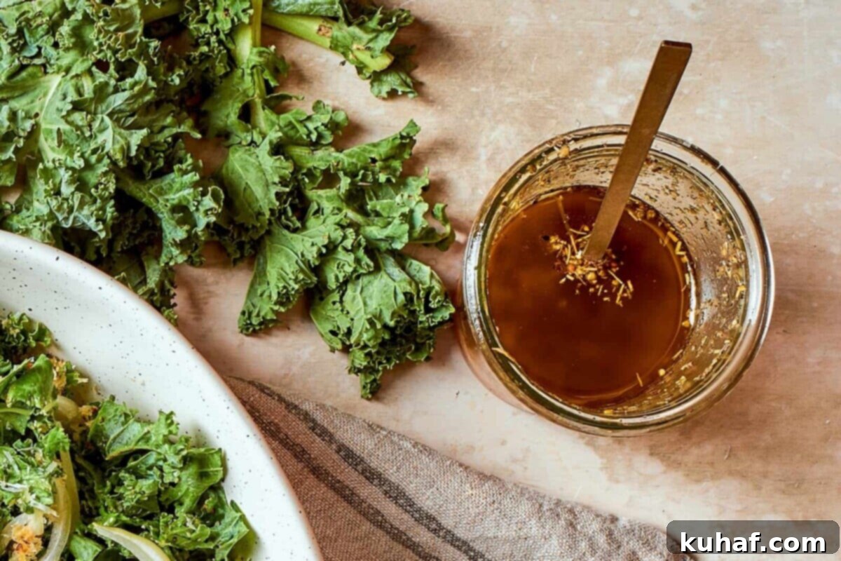 Homemade Italian salad dressing in a glass jar, perfectly mixed and ready to pour over crisp greens.