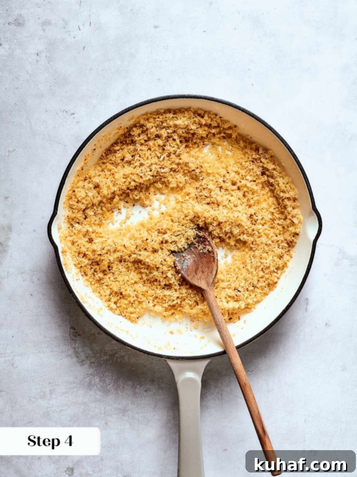 Golden toasted breadcrumbs finished in a skillet for Tuscan kale salad topping.