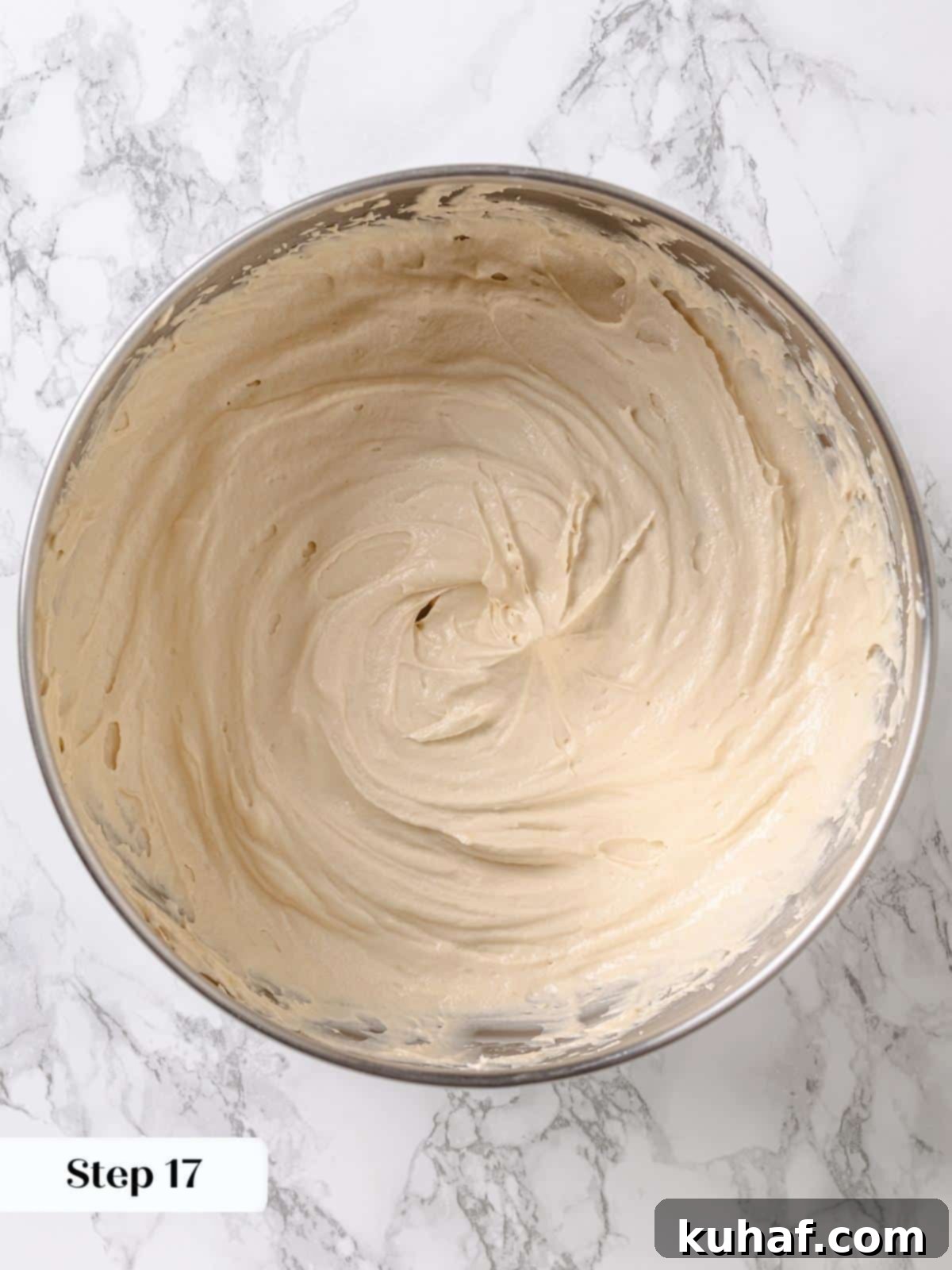 Pure Maple Indulgence 15 Bowl of perfectly whipped, light, and fluffy maple frosting, ready to be spread over delicious cake layers.