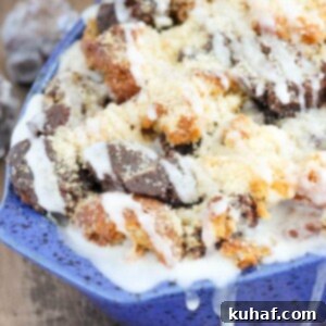 This Coffee Donut Bread Pudding takes everything you love about breakfast and bakes it into one easy dish! Cake donuts baked in a coffee custard for the perfect addition to brunch!