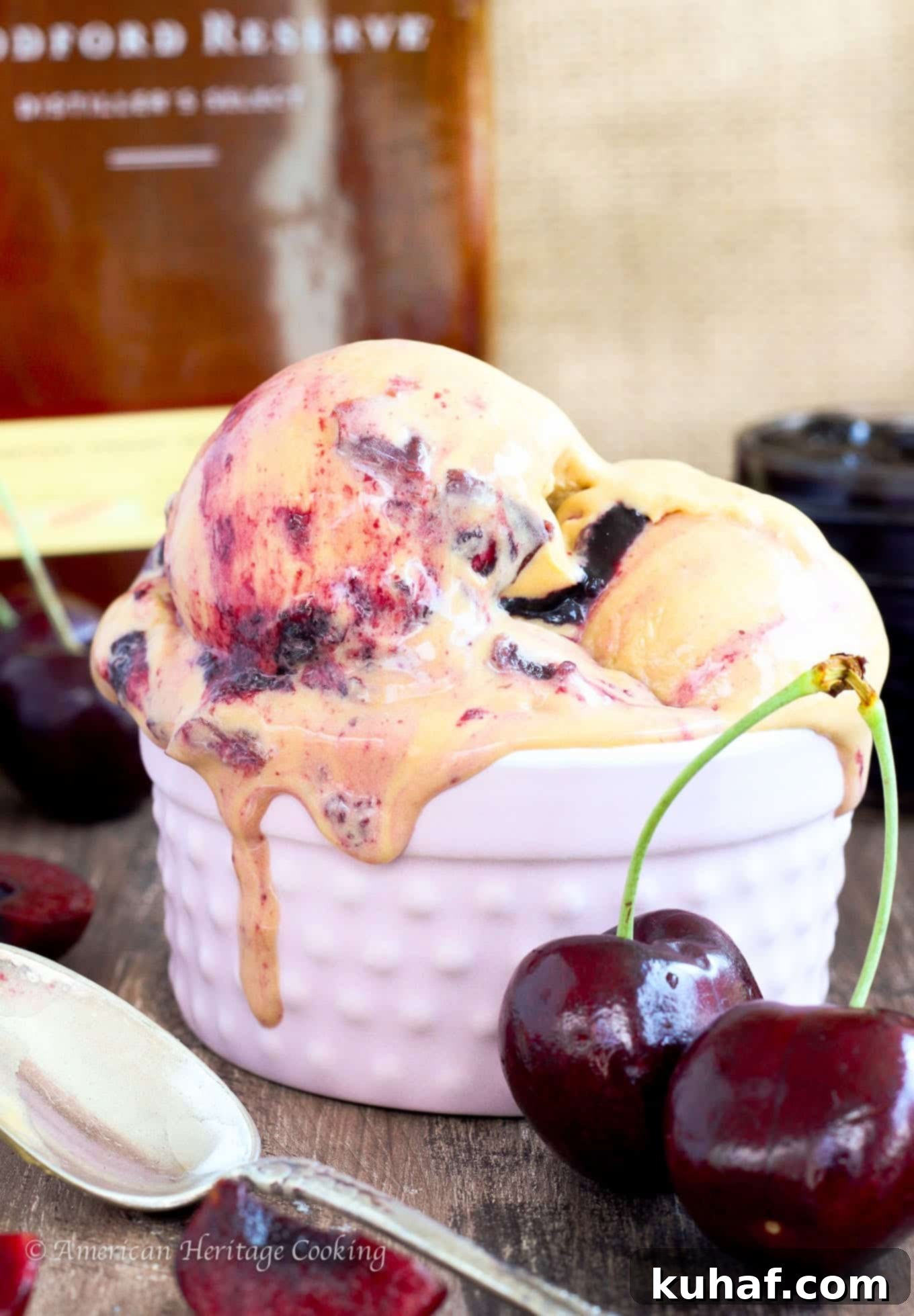 This Bourbon Cherry Caramel Ice Cream is a smooth, rich caramel ice cream with a homemade cherry jam swirl and Bourbon soaked cherries! 