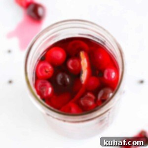 Pickled Cherries in mason jar with liquid