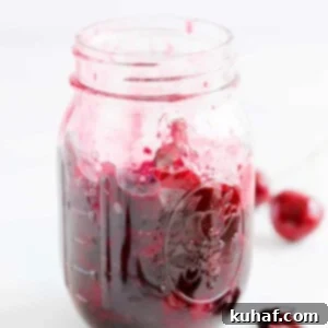 Cherry preserves in mason jar