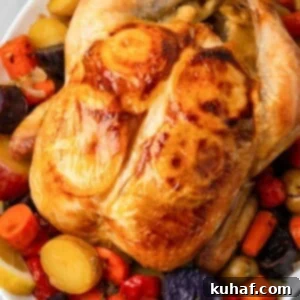 golden brown chicken with lemon underneath skin.