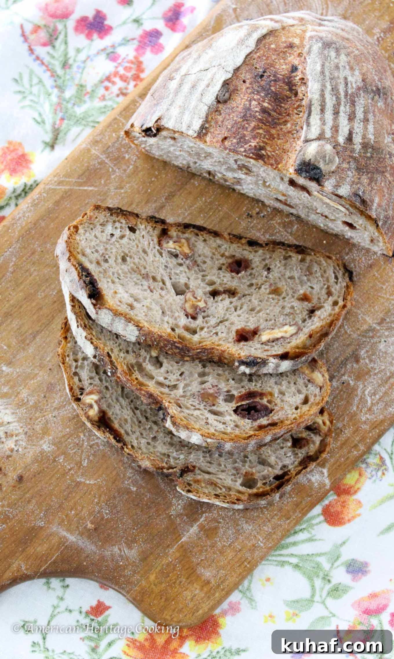 Close-up of Cherry Pecan Sourdough Bread, highlighting the rich, golden crust and visible specks of cherries and pecans.