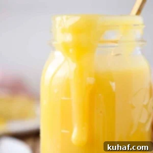 lemon curd dripping down the side of mason jar.