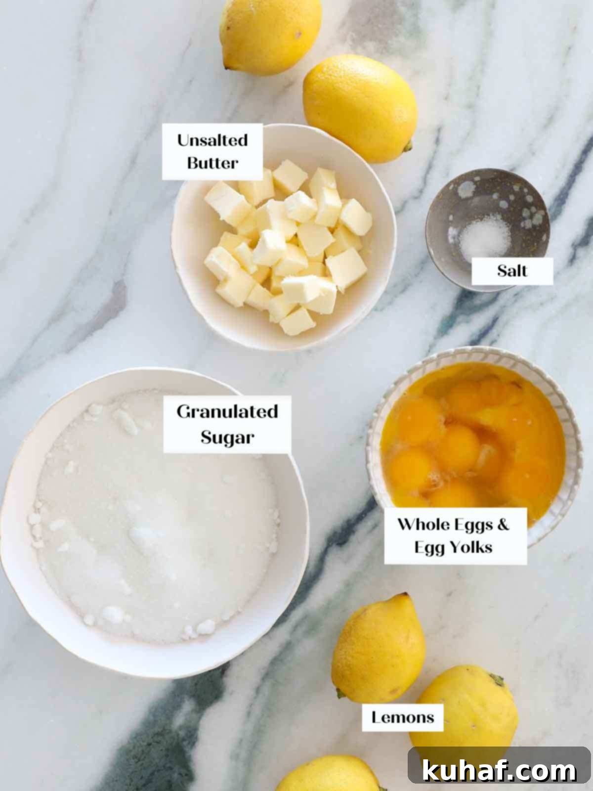 lemon curd ingredients on marble.