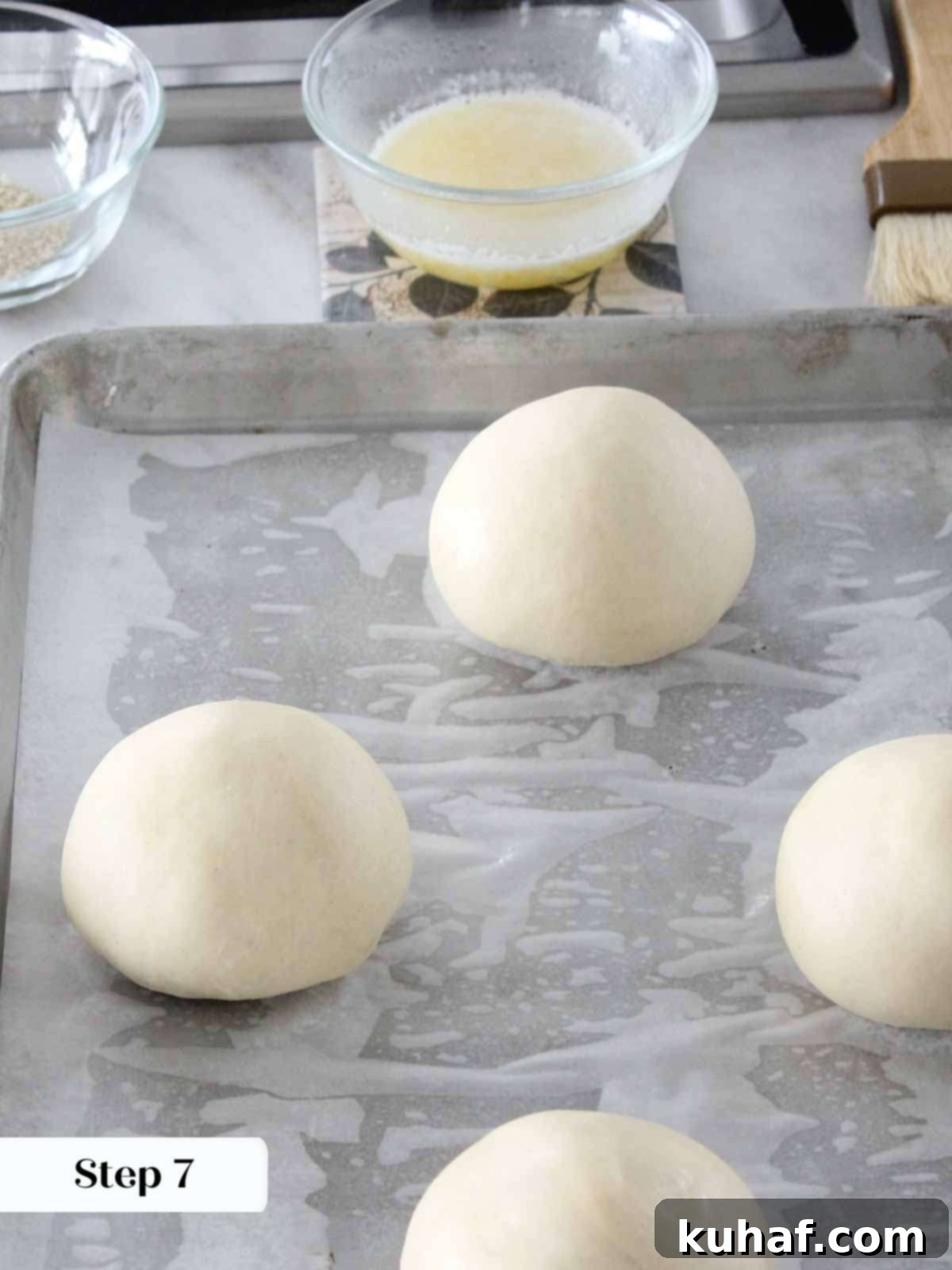 shaped proofed brioche buns.