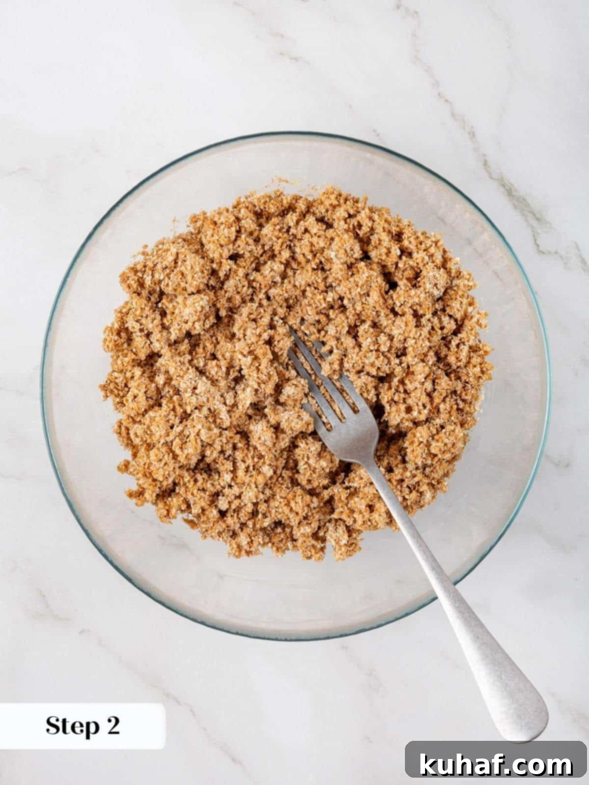 Buttermilk and wheat bran stirred together in a small bowl to soften before baking muffins.
