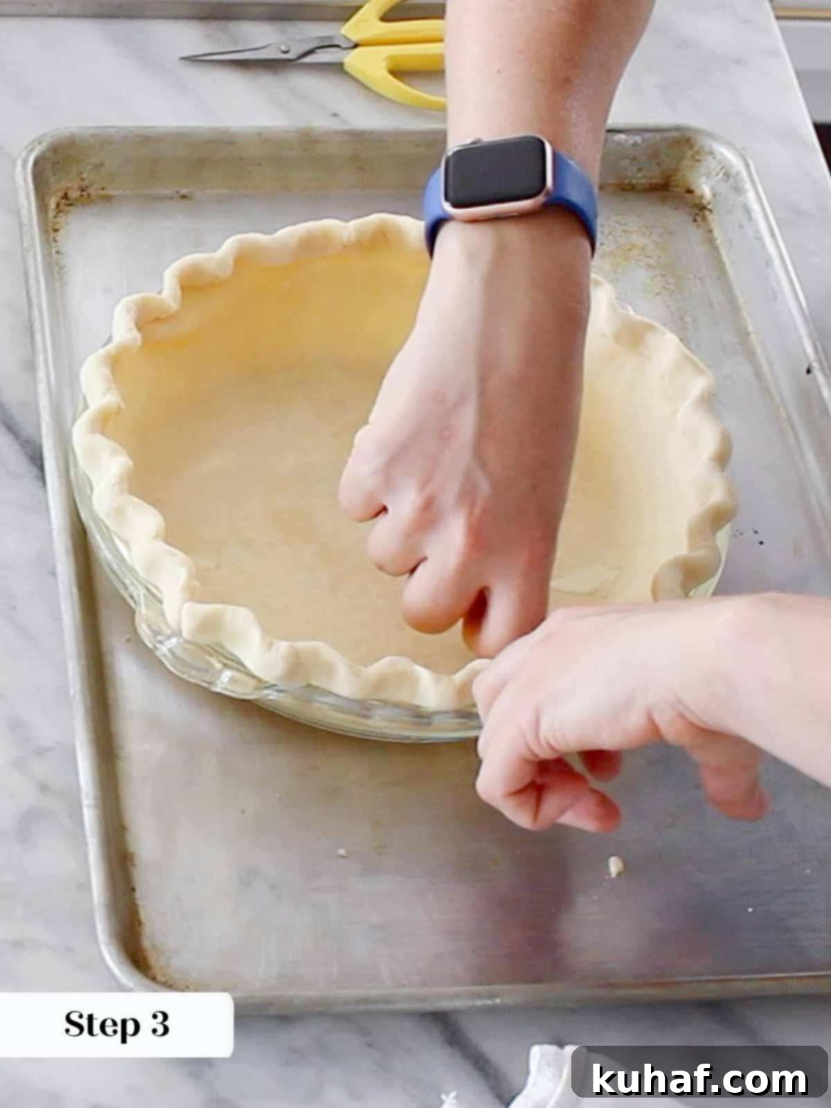 fluting pie dough.
