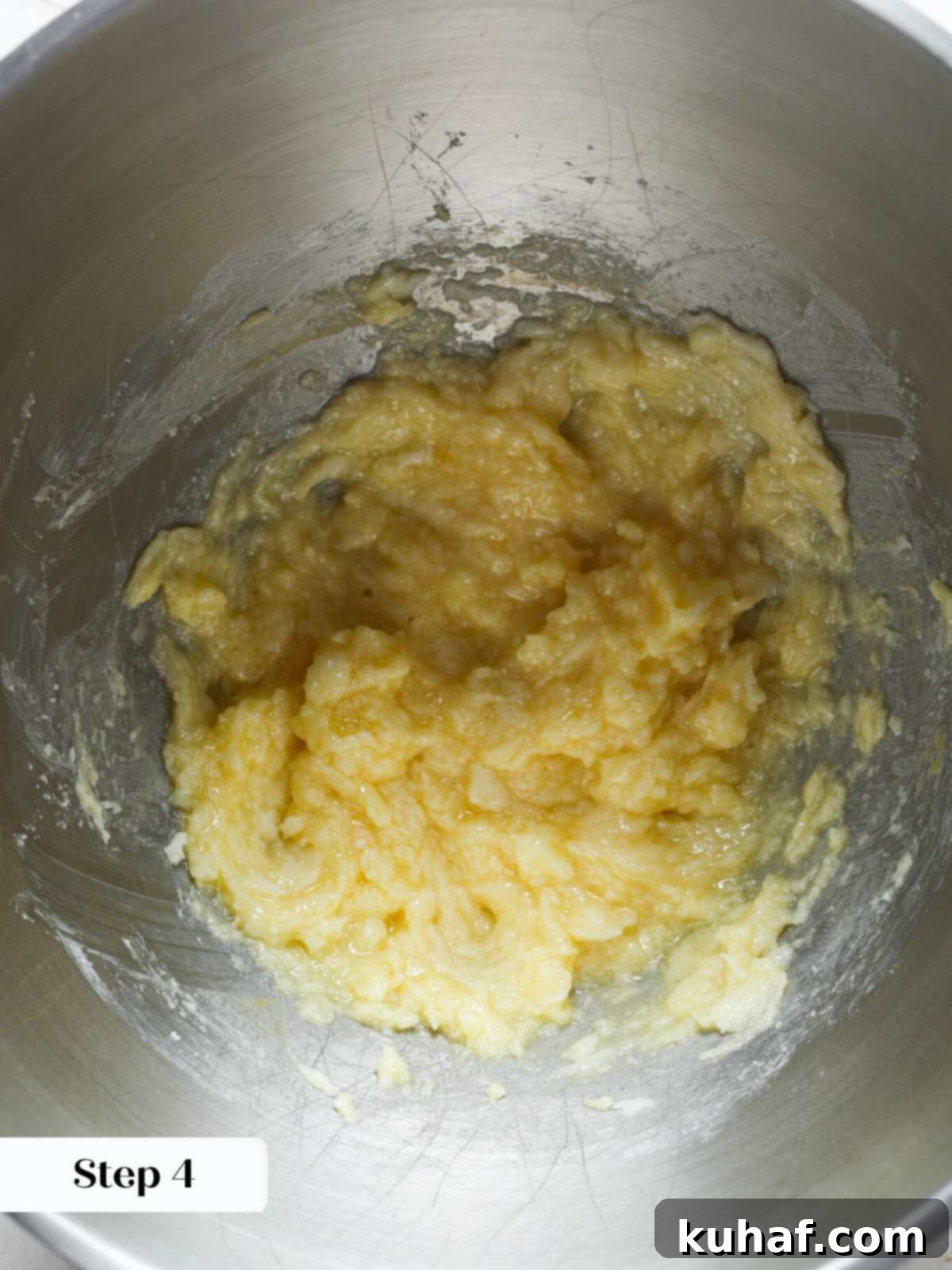 Ultimate Snickerdoodle Cookies 7 Adding eggs one at a time to the mixing bowl.