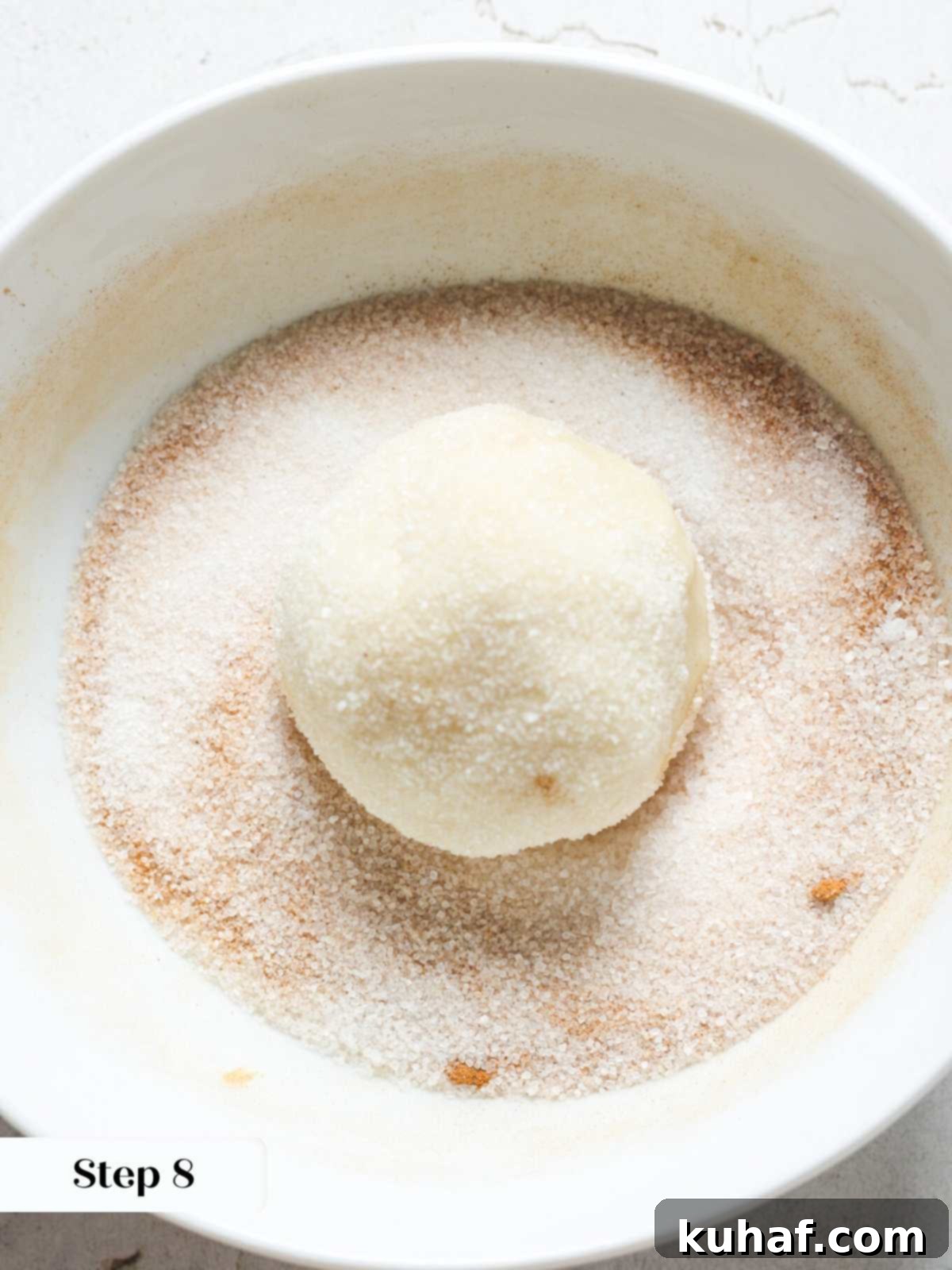 Ultimate Snickerdoodle Cookies 9 Snickerdoodle cookie dough ball rolled generously in cinnamon sugar.