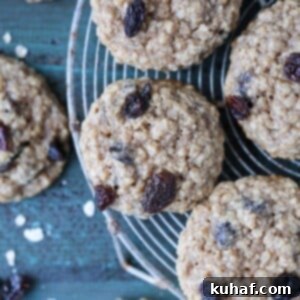 Old Fashioned Oatmeal cookies on metal cooling rack.