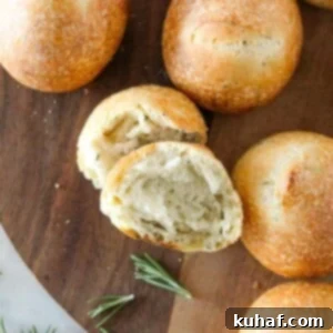 Artisan Rosemary Sourdough Rolls 5 Rosemary Sourdough Rolls on wooden tray