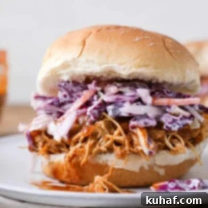 Slow cooker barbecue pulled chicken sandwich with cole slaw
