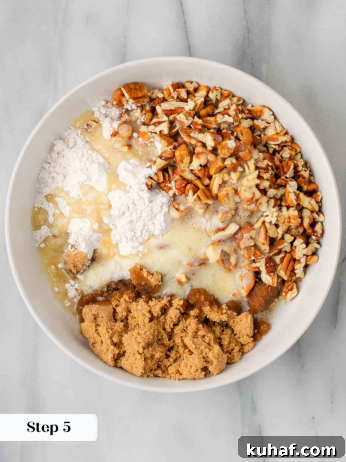 Decadent Sweet Potato Casserole with Crunchy Pecans 8 All the ingredients for the pecan streusel topping in a bowl, unmixed.