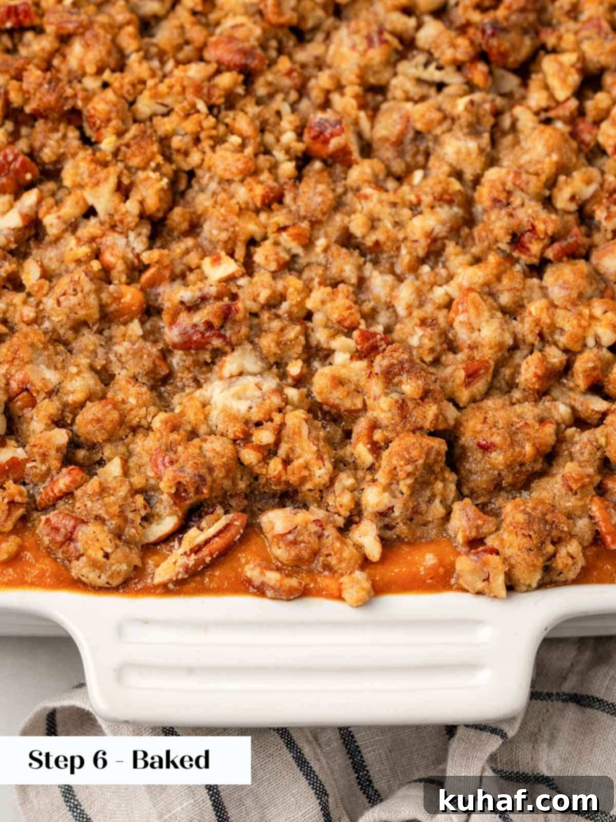 Decadent Sweet Potato Casserole with Crunchy Pecans 10 Baked sweet potato casserole with a perfect golden pecan crumble topping, fresh from the oven.