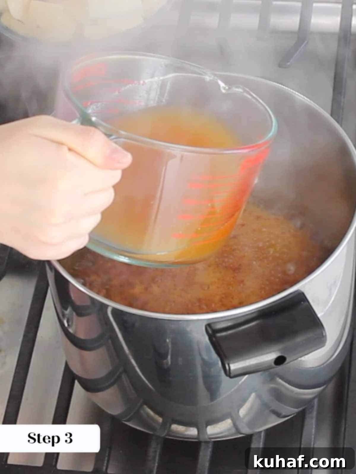 Caramelized Apple Spread 6 Adding apple cider to the dark amber caramel, creating a flavorful base for the apple butter.
