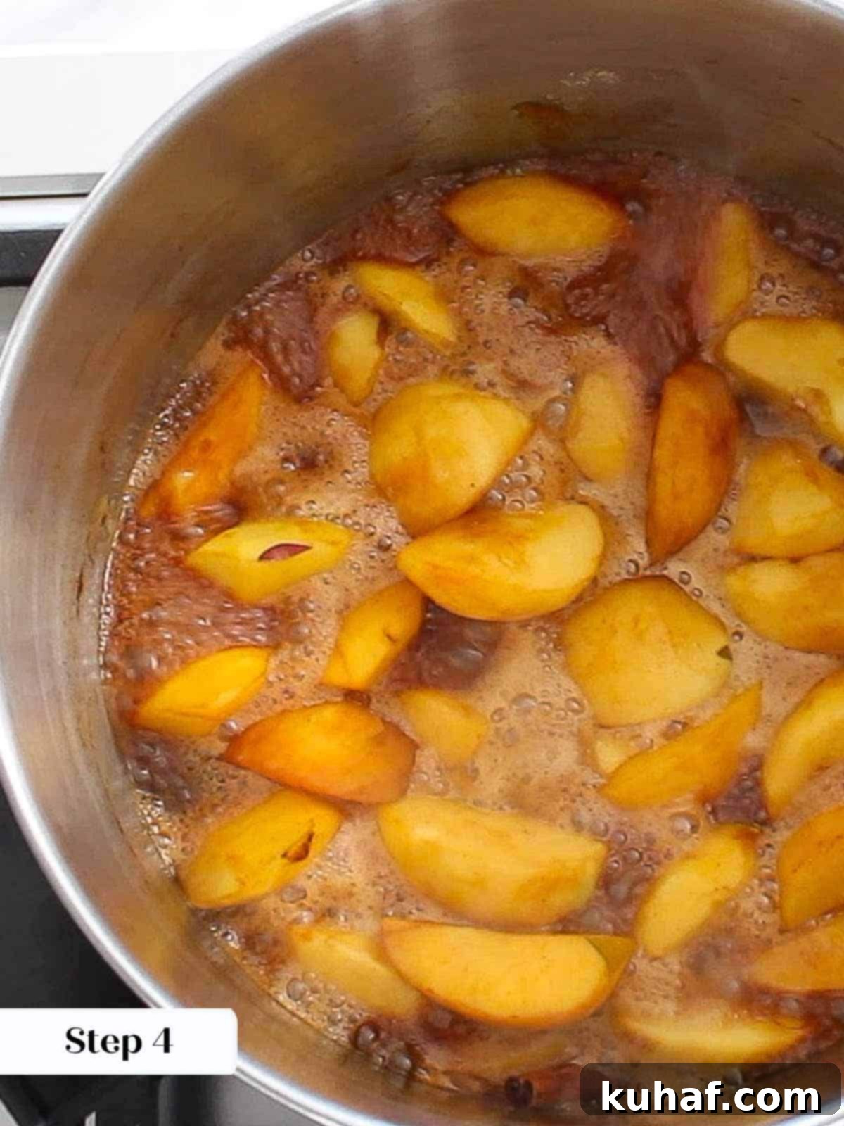 Caramelized Apple Spread 7 Apples and spices simmering in the pot, slowly transforming into rich apple butter.