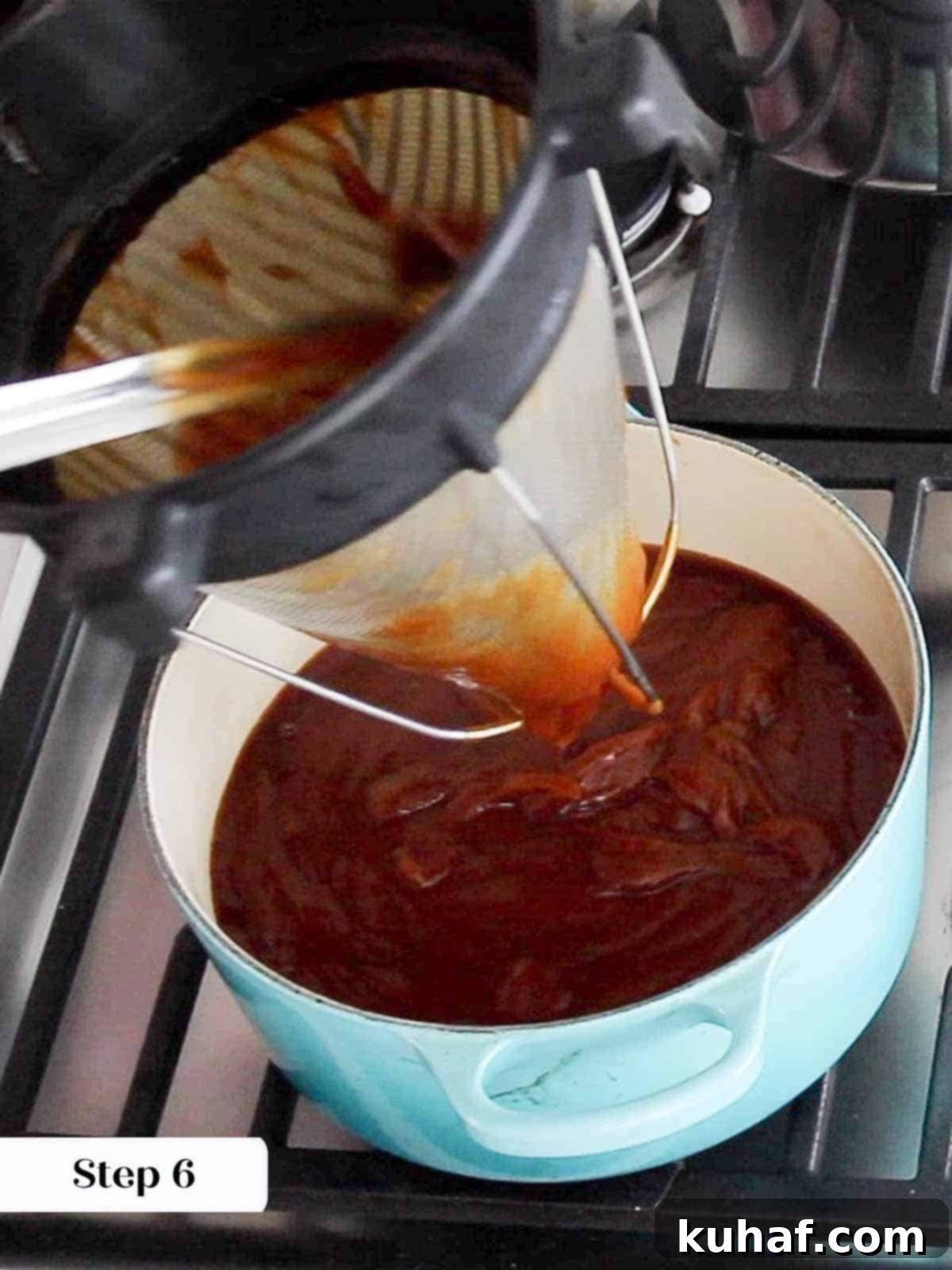 Caramelized Apple Spread 9 Straining apple butter through a chinoise to achieve a perfectly silky texture.