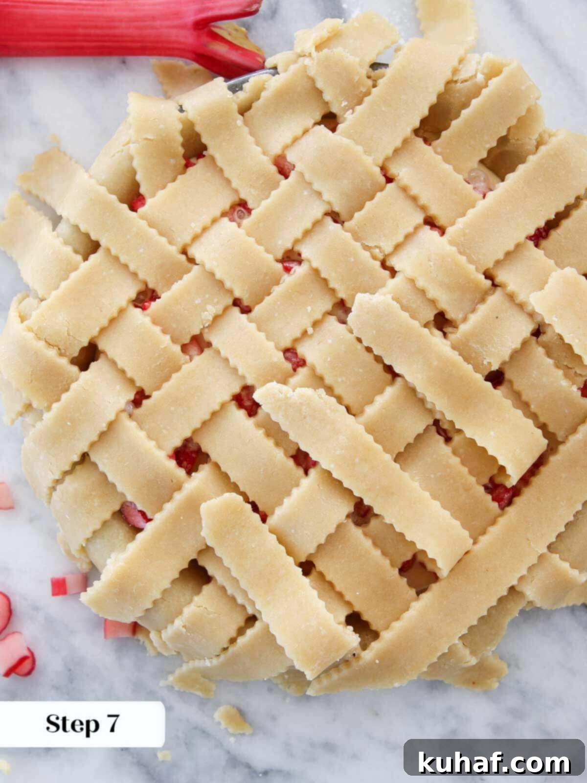 latticing pie crust on top of pie filling.