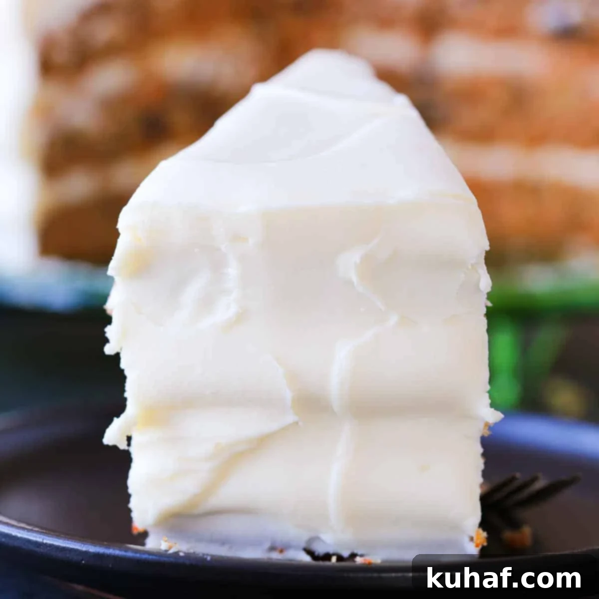 easy carrot cake slice with cream cheese frosting.