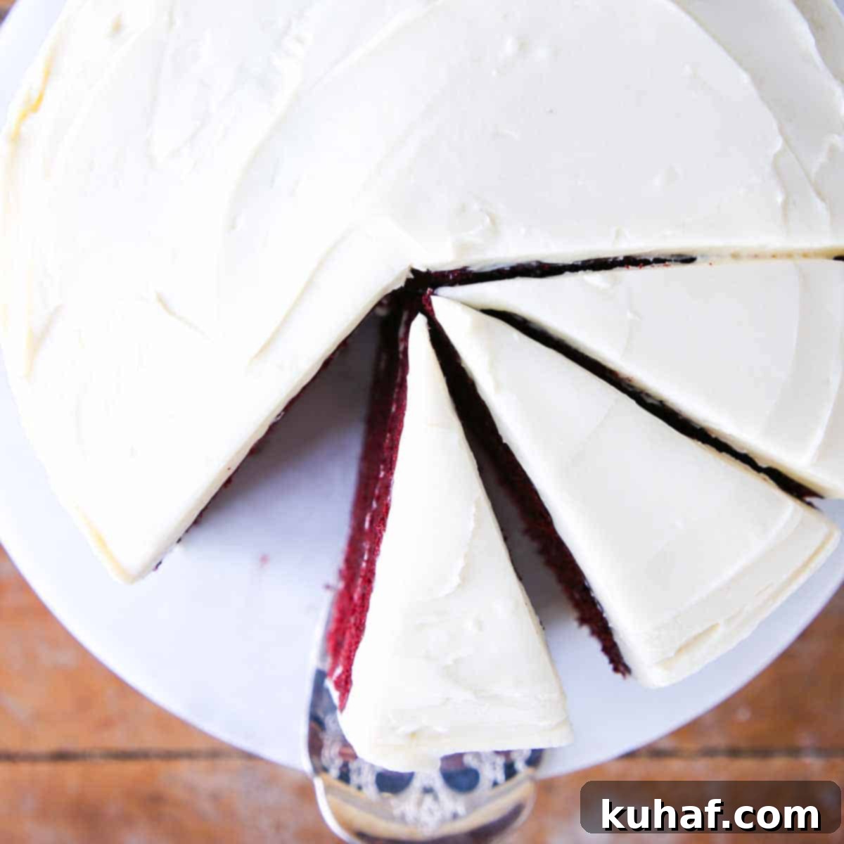 red velvet cake sliced with bourbon cream cheese buttercream.