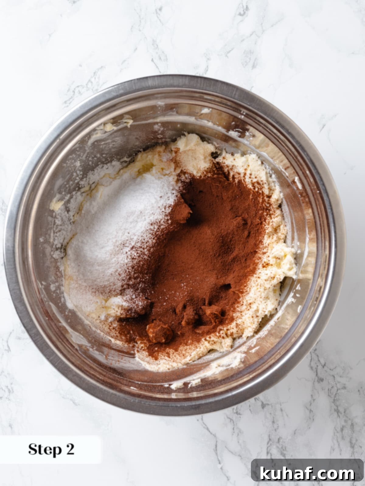 Chocolate Cream Cheese Dream Frosting 7 Dry ingredients sifted smoothly for chocolate cream cheese frosting preparation.