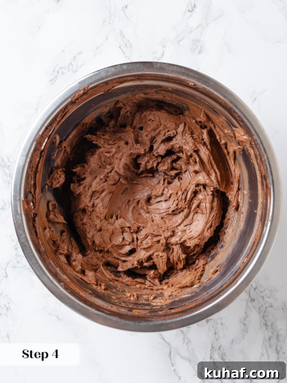 Chocolate Cream Cheese Dream Frosting 8 Chocolate cream cheese frosting beaten until fluffy and airy in mixing bowl.
