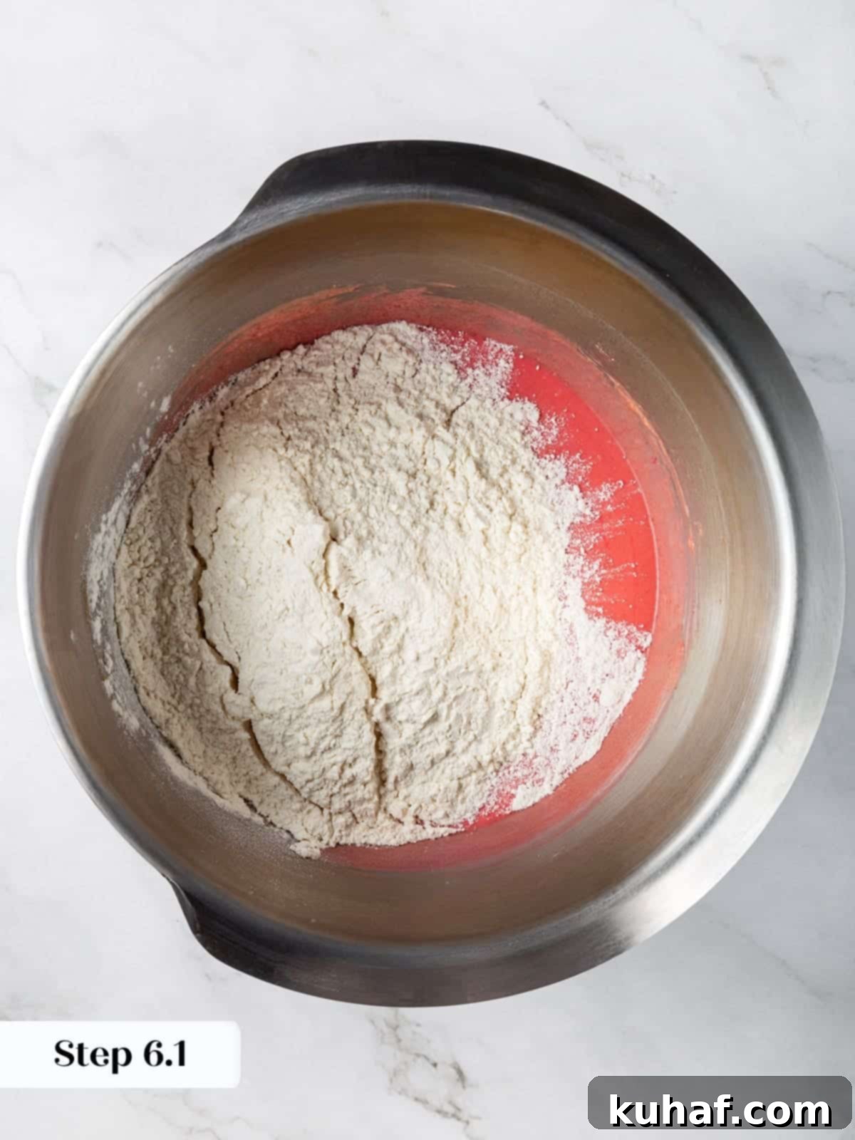 Cherry Chocolate Chunk Cookies 10 Dry ingredients incorporated into cookie dough during cherry cookie preparation.