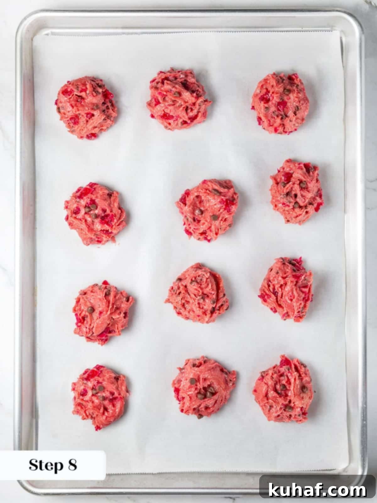 Cherry Chocolate Chunk Cookies 13 Scooped cherry chocolate chip cookie dough portions arranged for chilling.