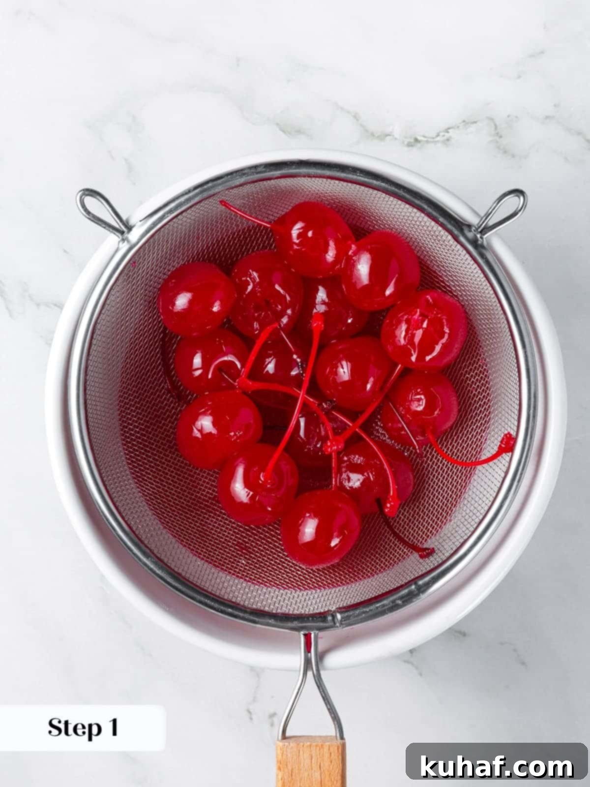 Cherry Chocolate Chunk Cookies 5 Maraschino cherries draining in a sieve to remove excess liquid.